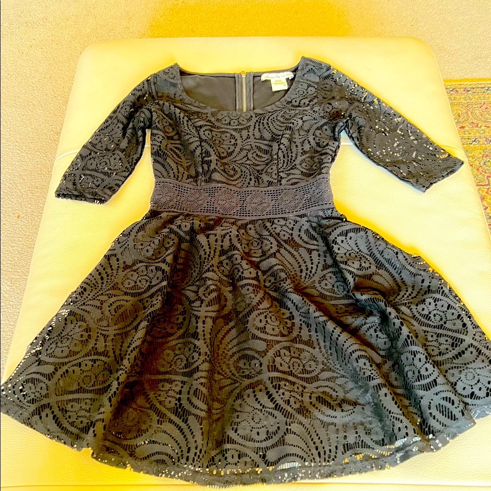 NWOT American Rag dress in black less with lining, zipper, never used